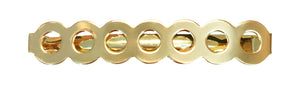 Image of a barrette that has a row of circles  in gold on a white background