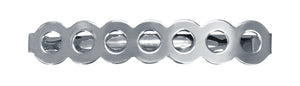 Image of a barrette that has a row of circles  in silver on a white background