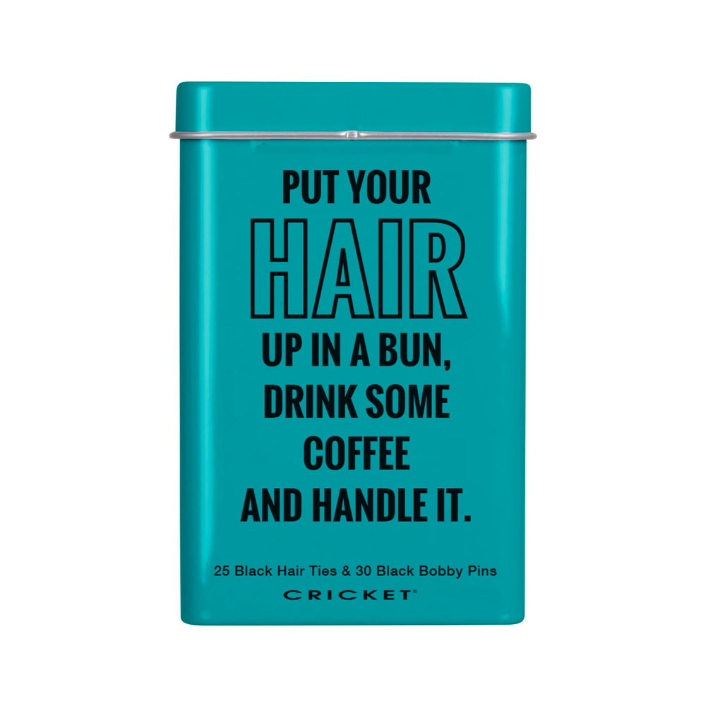 A teal metal tin with a lid and black text that reads, 'PUT YOUR HAIR UP IN A BUN, DRINK SOME COFFEE AND HANDLE IT.' Small text at the bottom says '25 Black Hair Ties & 30 Black Bobby Pins' and the brand 'CRICKET' appears below.