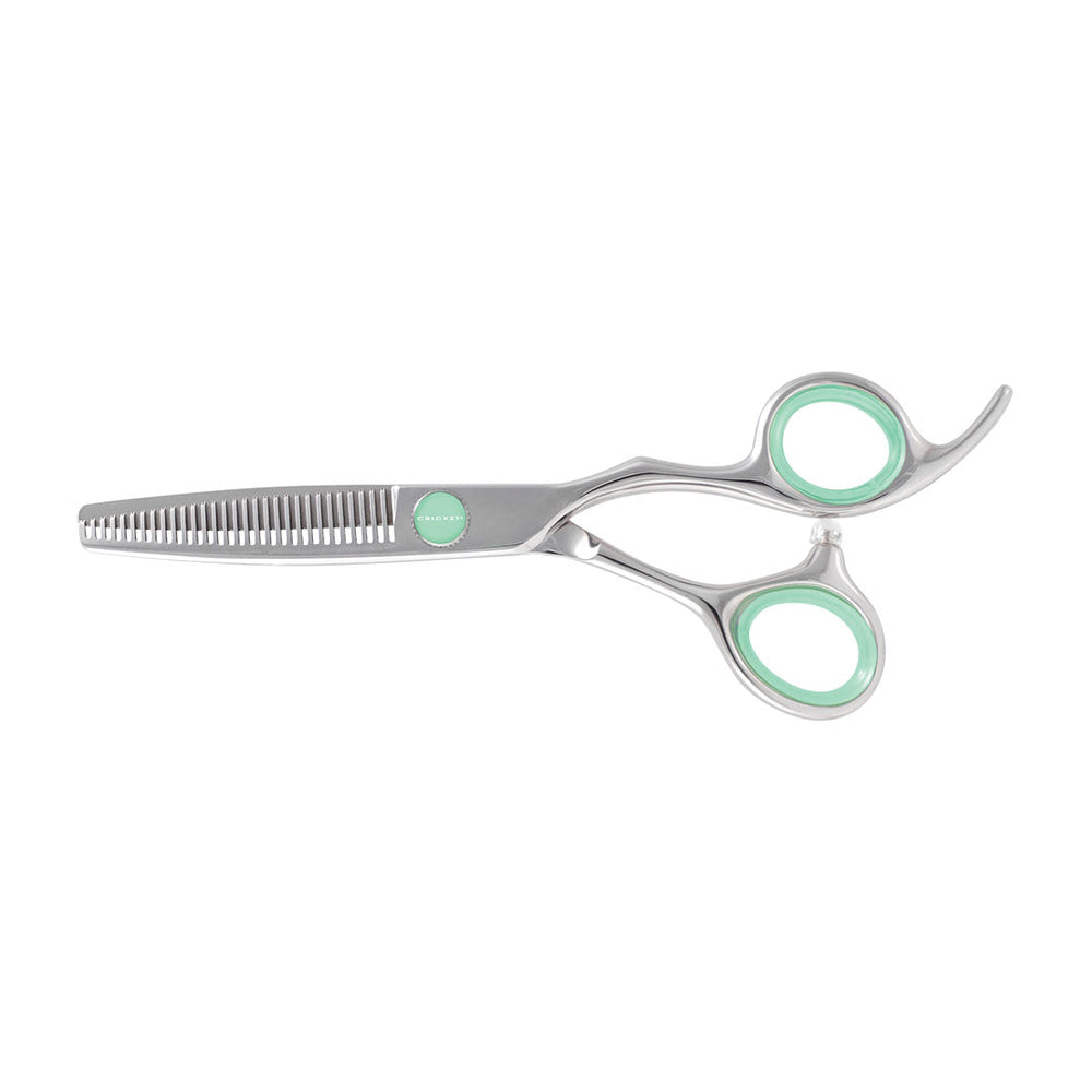 Metallic silver hairdressing scissors with mint green accents on the handles and a matching mint green logo button, shown on a plain white background.